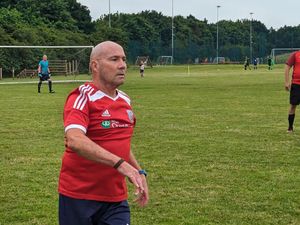 Supporting image for story: Tributes paid to much-loved football coach who died after collapsing during charity match