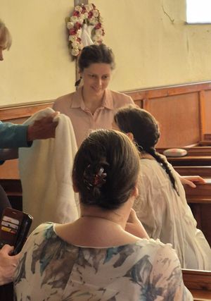 The first baptisms since 1990 of Sue and Lucy Pritchard, were performed by regional Baptist minister David Ellis