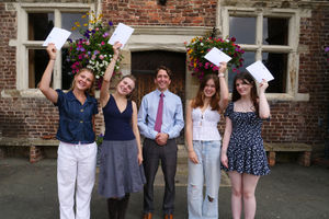 Moreton Hall students with Mr Brewer, Principal
