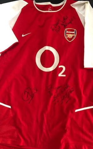 Arsenal shirt signed by former Arsenal players and staff