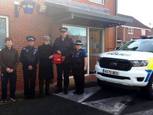 Supporting image for story: Charity presents Newport police team with lifesaving defibrillator 