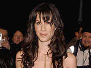 Supporting image for story: Tortured Alanis opens up to fun