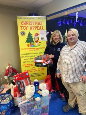 Keeran's Kardz one of our Toy Donation points.  President Debra Coburn with Keeran Hart.
