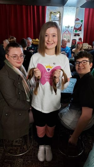 Maisie with her older brother Jonah (15) and her older sister Keira (18)