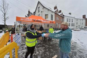 Rob Collins enjoys a meal from Khalsa Aid