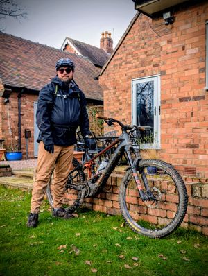 James Talbot with his assisted mountain bike getting ready for his weekly training ride. 