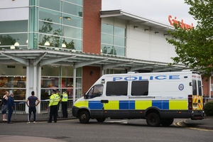 Police remained at the scene as investigations continued on Saturday