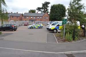 Part of the residents' car park was also cordoned off