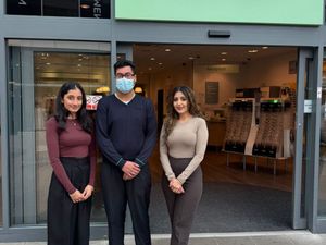 Supporting image for story: Optical team raise their glasses to newly qualified colleagues