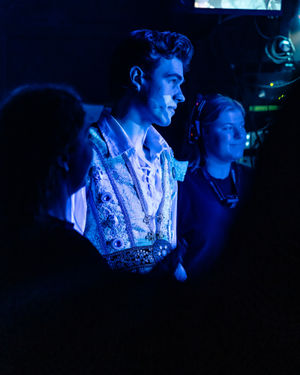 Solomon Davy keeps an eye on what's happening on stage in the technical area. Photo: Danny Kaan