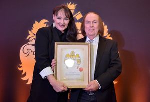 Dave Hill presents Frances Barber with an award