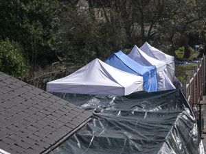 Supporting image for story: Forensic tents set up in garden as police hunt for clues on schoolboy missing since 1999