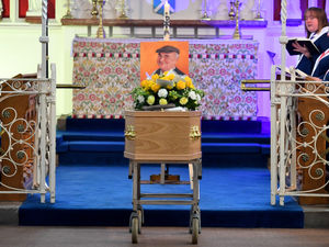 Supporting image for story: Funeral of much-loved comedian Aynuk is held - with his flat cap pride of place