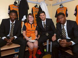 Supporting image for story: Wolves treat for mascot Lauren