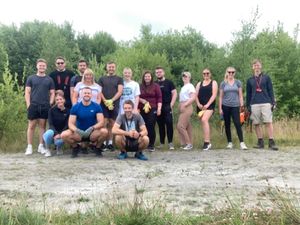 Supporting image for story: Housing firm volunteers help at nature reserve