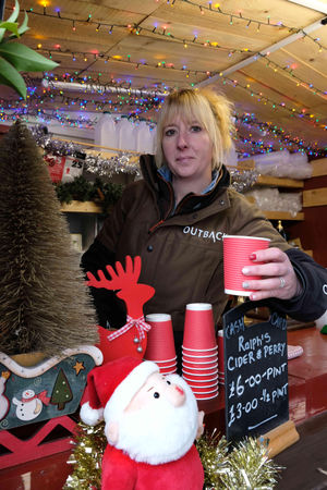  Amy Owens serving up mulled cider and perry on Ralph’s Cider stand at the Winter Fair. Ralphs Cider business is based at  Badlands Farm at Kinnerton. Image by Andy Compton