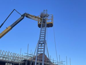 Supporting image for story: Man rescued from hydraulic platform 20ft in the air after mechanical malfunction