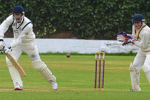 Bridgnorth wicketkeeper Simon Gregory prepares to pouch the ball as Brewood's Dan Smith plays and misses at a delivery from Dave Exall.