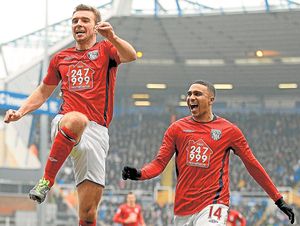 James Morrison (left) celebrates scoring for West Brom in 2011.