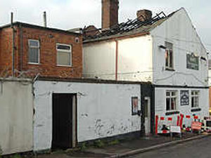 Supporting image for story: Pub roof collapses after fire