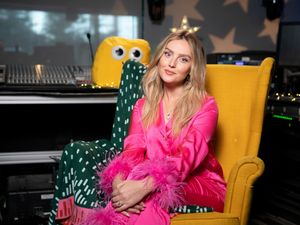 Supporting image for story: Perrie Edwards to read CBeebies Bedtime Story wearing bright pink pyjamas