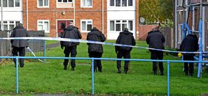 Police and scene of crime officers at Lilleshall Crescent, Wolverhampton, after a murder inquiry is launched after man is shot dead.