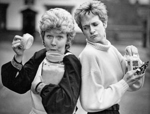 January 4, 1989: A sweet treat is in store for Dudley people with the opening of a 20s-style confectioners at the Black Country Museum. But before the business lifts up the shutters museum experts are keen to know how a Black Country sweet shop of that period was run. Miss Ann Lineen, assistant keeper of social and industrial history, is appealing for anybody from the area who worked in the trade to come forward with their know-how. The shell of the building is already in place and miniature sweet mangles used in the trade have been salvaged from an old Birmingham store. 'We are hoping to get in contact with anybody who has worked in a bakers or a sweetshop in the area,' she said. Eileen Kendrick (left) a guide at the Black Country Museum, opens up a jar of traditional kali, while Anne Lineeen (right), assistant keeper at the museum, tucks into her ordinary sweets