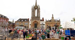 Traders busy in Devizes Market Place complete with its 200-year-old market cross, Corn Exchange and much-visited Bear Hotel