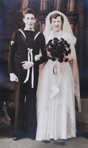 On their wedding day on December 26, 1955