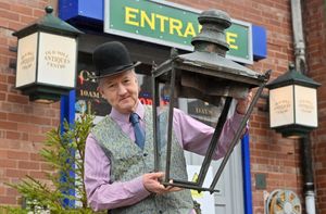 Kevin Sharp with the historic Malvern gas street lamp top. Photo: Steve Leath
