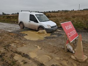 Supporting image for story: Maybe the worst pothole in Shropshire: Road closed as chasm opens up on South Shropshire route