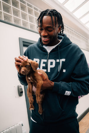 Tammy Abraham with a puppy