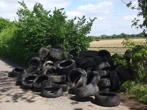 Supporting image for story: Police investigating after tyres dumped on Shropshire country lane