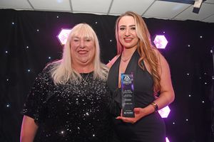 BUSINESS COPYRIGHT NATIONAL WORLD TIM STURGESS 13/11/24.  Ladder for the Black Country  Apprentice Awards 2024 .The Richardson Suite at West Bromwich Football Club. Pictured,Jackie Coleman presents the tech,digital and creative award to D'arcy-May Jones.