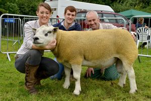  Emily, Matthew and Andrew Meredith with their Texel sheep which won first prize in the aged ram category 
