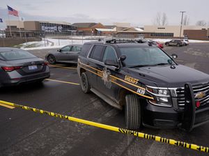 Supporting image for story: Teenager charged over high school shooting that left four dead