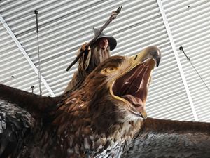 A sculpture of an eagle, ridden by the wizard Gandalf, hangs over the food court area of Wellington Airport in New Zealand
