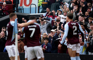Aston Villa players and fans celebrate after John McGinn’s goal (Photo by Michael Regan/Getty Images)