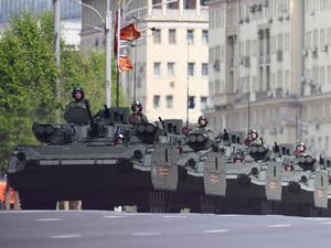 Russian infantry fighting vehicles roll along the Garden Ring after the Victory Day military parade general rehearsal in Moscow on Wednesday