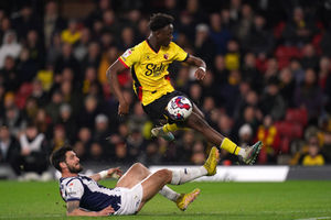 West Bromwich Albion's Okay Yokuslu (left) challenges Watford's Ismael Kone (PA)