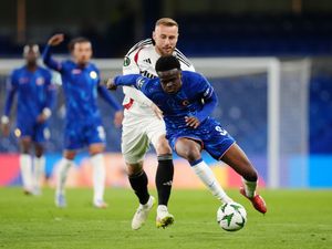 Tyrique George and Legia Warsaw’s Rafal Augustyniak battle for the ball