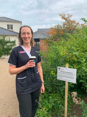 Jenny Charlton, Complementary Therapist at Katharine House Hospice, with her mindfulness prompt she created.