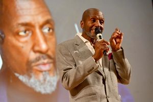 Dr Willard Wigan MBE speaks to the audience at the Young Citizen of the Year awards