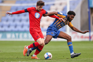 Callum Lang of Wigan Athletic and Ro-Shaun Williams of Shrewsbury Town (AMA)