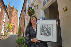 Julia Timmins showing off some of the art on display in the trail.