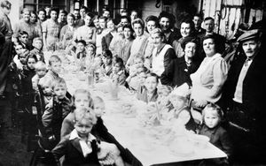 Newport's VE Day celebrations started in Springfield Terrace, before rain caused them to move to the garage in Stafford Road. Beryl Lawley, of Station Terrace, Newport, is on the left row of the table, second one in, with the bottom of her face obscured. Her brother Colin Lawley is on the right hand side of the table, seated at the far end.