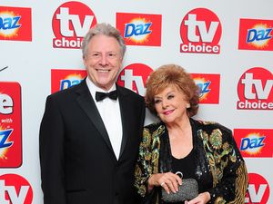 Philip Lowrie (left) and Barbara Knox (right) at the TV Choice Awards in London