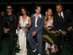 Supporting image for story: Victoria Beckham supported by family at Paris Fashion Week show