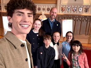 Blue Peter presenter Joel Mawhinney, competition winners Annie, Llewyn, Mia, Ruby and Marni with the Prince of Wales