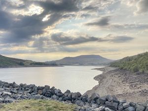 Supporting image for story: Warning not to walk on dried up reservoir beds after person gets stuck in the mud